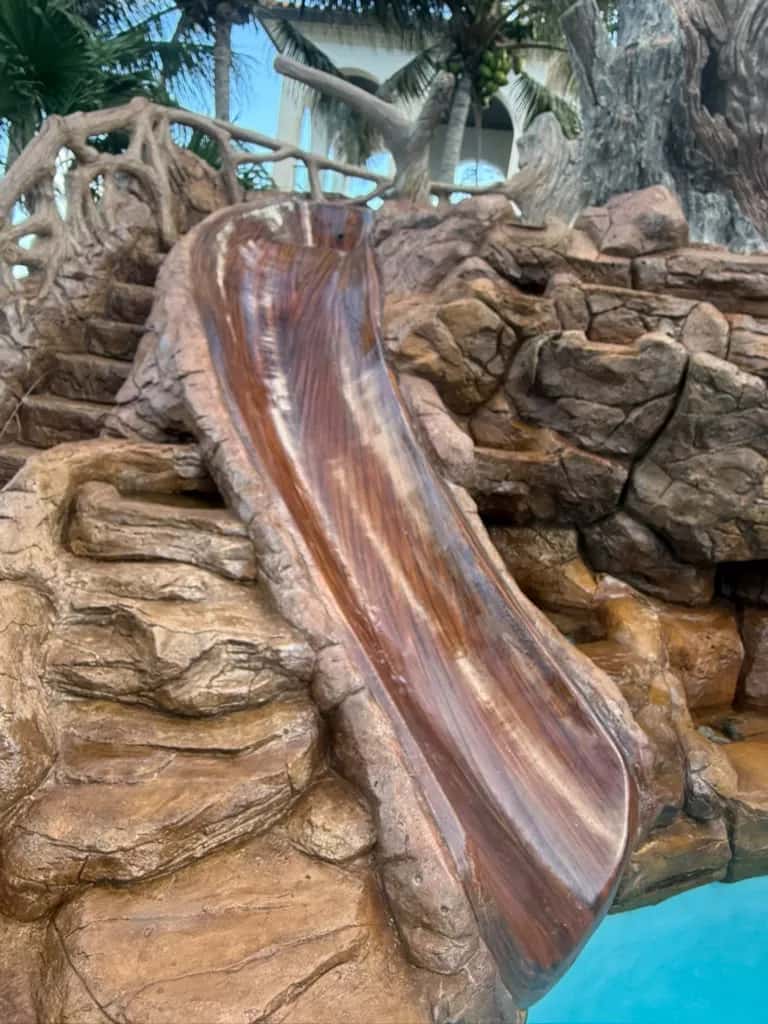 Sculpted rock pool slide